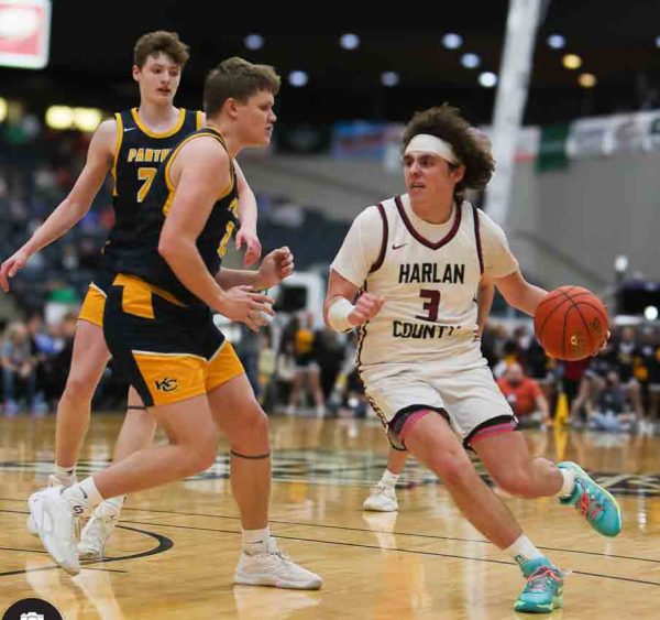 Harlan County guard Maddox Huff worked against Knox Central's Tydus Summers in action from the 13th Region Tournament on Wednesday. Huff scored 28 points in the Bears' 61-49 victory.