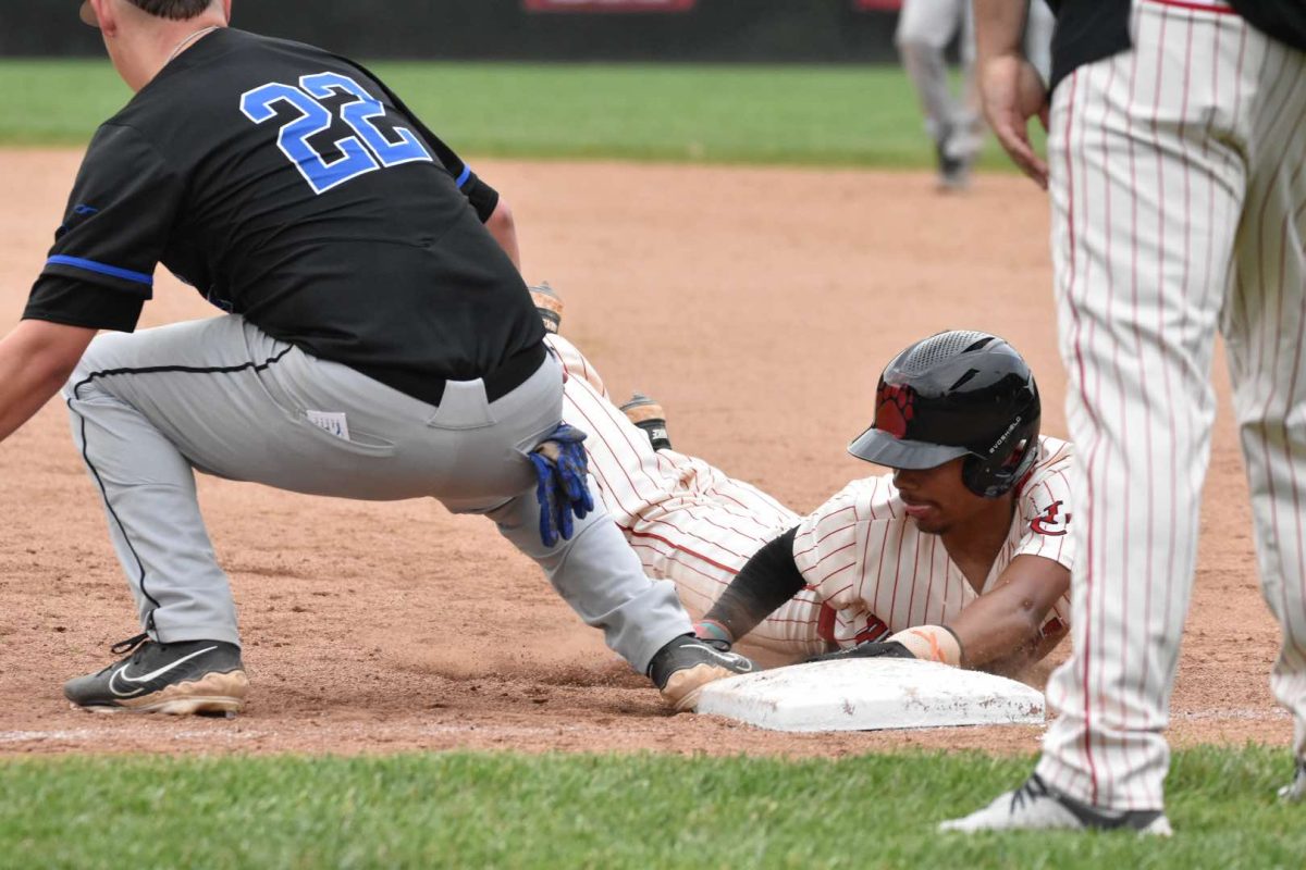 Harlan County’s DaShaun Smith worked his way back to first base in Thursday’s game against Letcher Central. Smith had a hit and scored the game-winning run in the seventh as the Bears walked off with a 12-11 victory.
