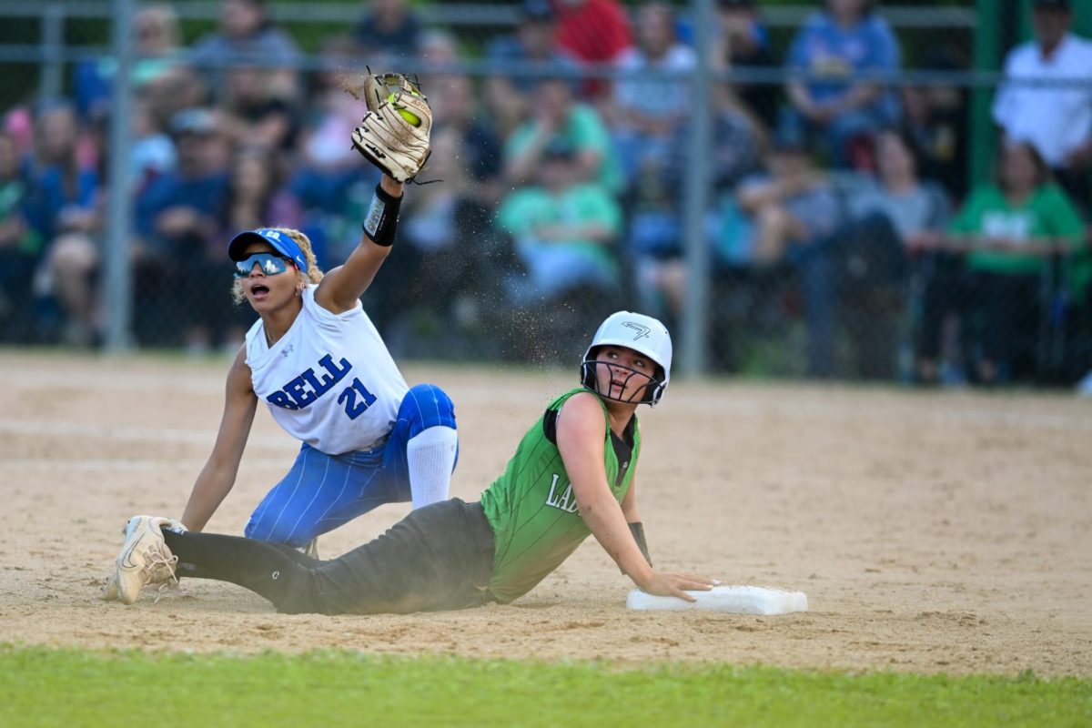Bell County shortstop Jayda Boateng showed the umpire the baseball after tagging out Harlan's Ella LIsenbee in action from the 52nd District Tournament on Monday.