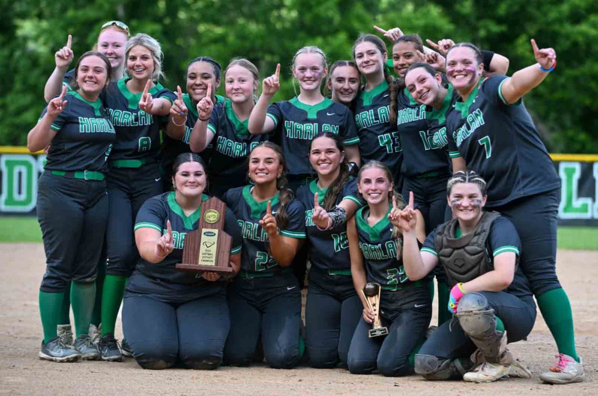 The Harlan Lady Dragons captured their second straight 52nd DIstrict Tournament title Wednesday with a 7-1 win over Harlan County.