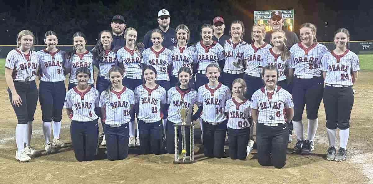 Harlan County won the Kentucky Middle School Fast Pitch Conference title with an 8-7 victory Wednesday over Harlan. Team members include, from left, front row: Chloe Brock, Sadie Huckleby, Campbell Thompson, Natalie Charles, Aniston Burton, Maddy Barrett and Bella Ford; middle row: Bella Miniard, Kennedy Estes, Addi Estes, Khloe Daniels, Chloe Perkins, Zoey Reed, Jaylin Robinson, Kelsie Middleton, Raegan Landa, Maddy Fields, Avery Jenkins, Riley Owens and Gracie Estes; back row: coaches Brad Kelly, Andrew Burton, Robbie Middleton and Tony Charles.