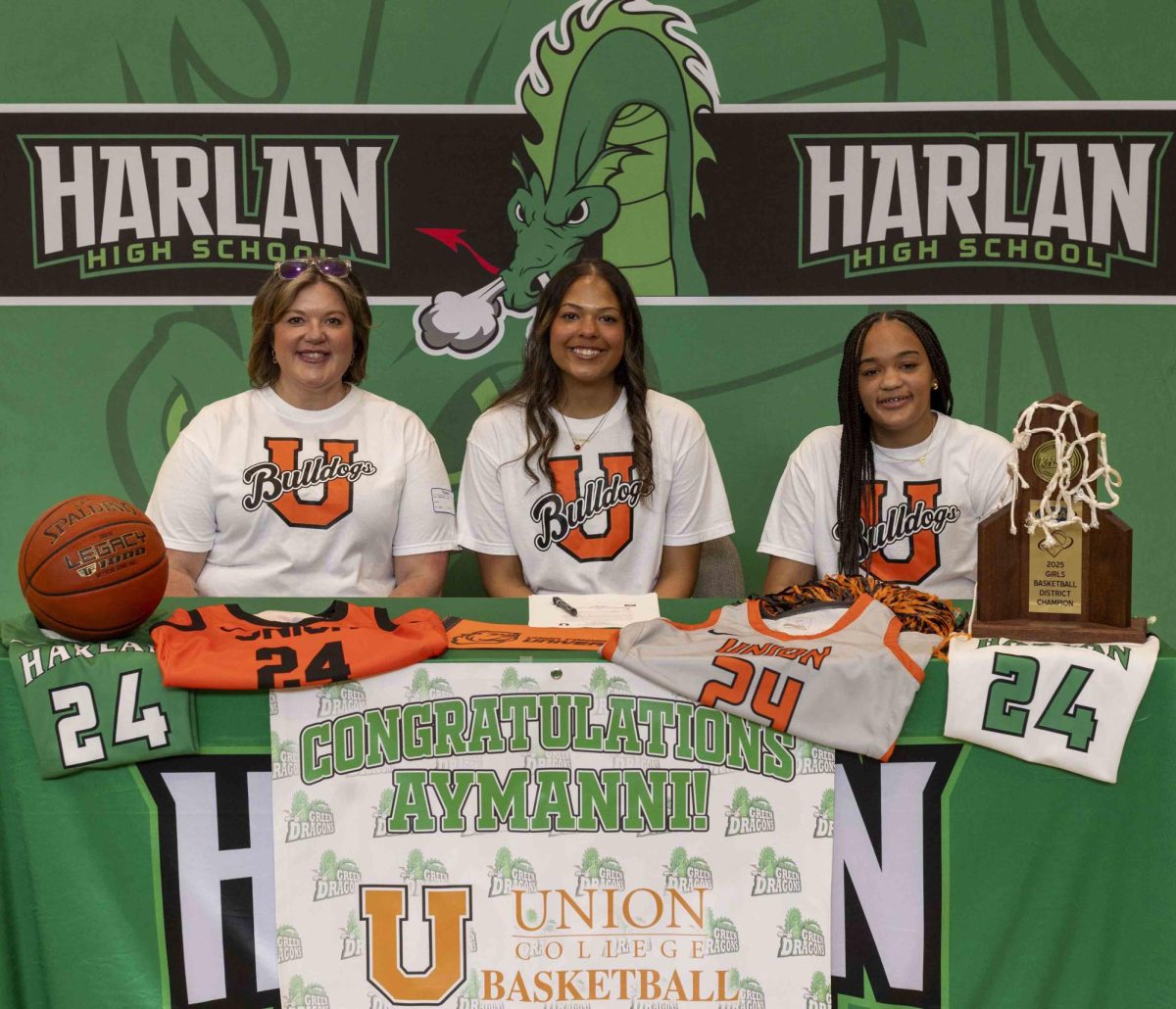 Harlan’s Aymanni Wynn signed with Union Commonwealth University in ceremonies last week at the school. She is pictured with her mother, Savanna, and sister, Peyshaunce.