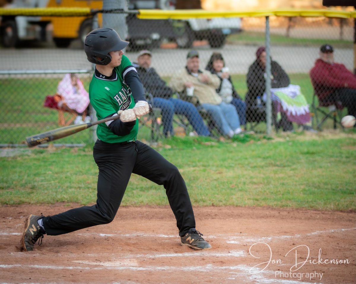 Harlan junior Brody Owens pounded out three hits and earned the win on the mound as the Green Dragons closed the regular season with a 7-3 win in nine innings at Perry Central.
