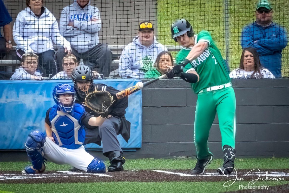 Harlan's Eli Freyer connected on an RBI single during the Green Dragons' 5-1 win over Barbourville in the first round of the 13th Region Tournament at Bell County.