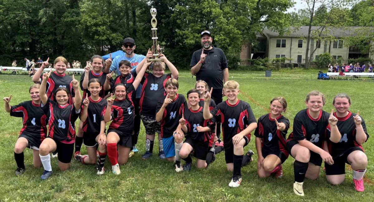James A. Cawood placed first in the elementary school division in the county soccer league.