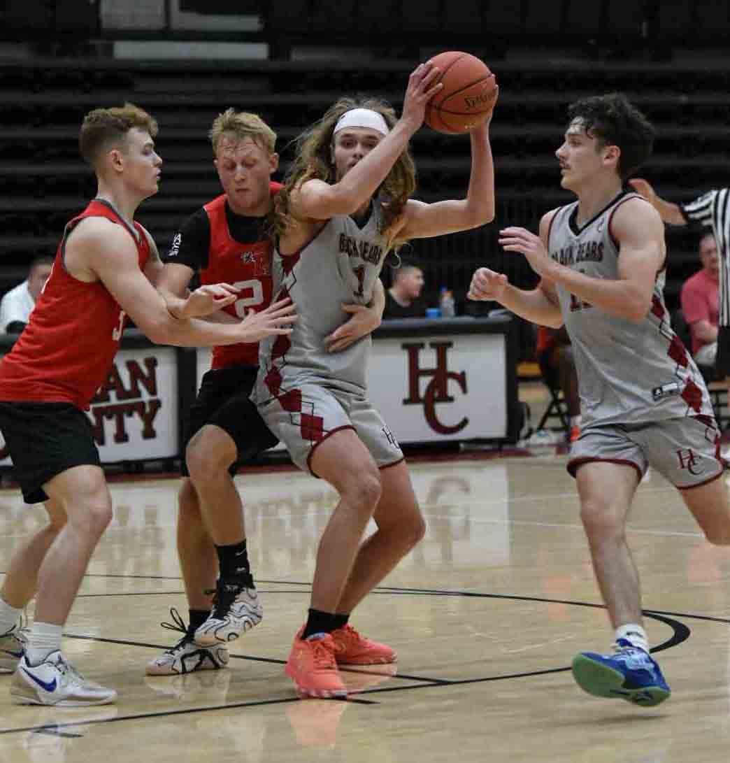 Harlan County guards Reggie Cottrell (1) and Trent Cole (12) worked against the Perry Central defense in summer action earlier this week. Both players reached double figures Thursday in a 59-43 win over Whitley County as part of the Whitley County Team Camp. The Harlan County junior varsity team lost to the Clinton County varsity. A combined junior varsity/freshman team for HCHS fell 42-40 to Whitley County. The varsity Bears improved to 5-1 with the win.