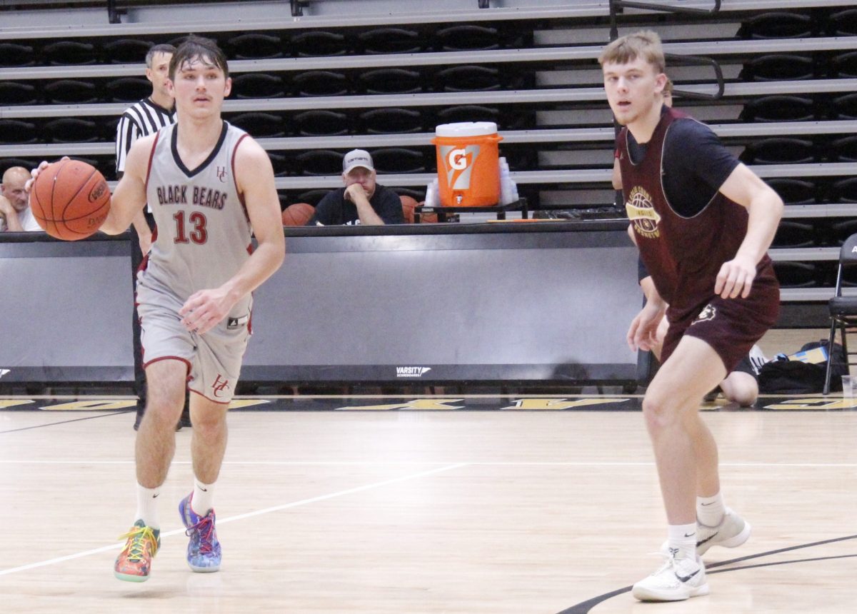 Harlan County guard Brady Smith worked down the court in scrimmage action Monday against Leslie County.