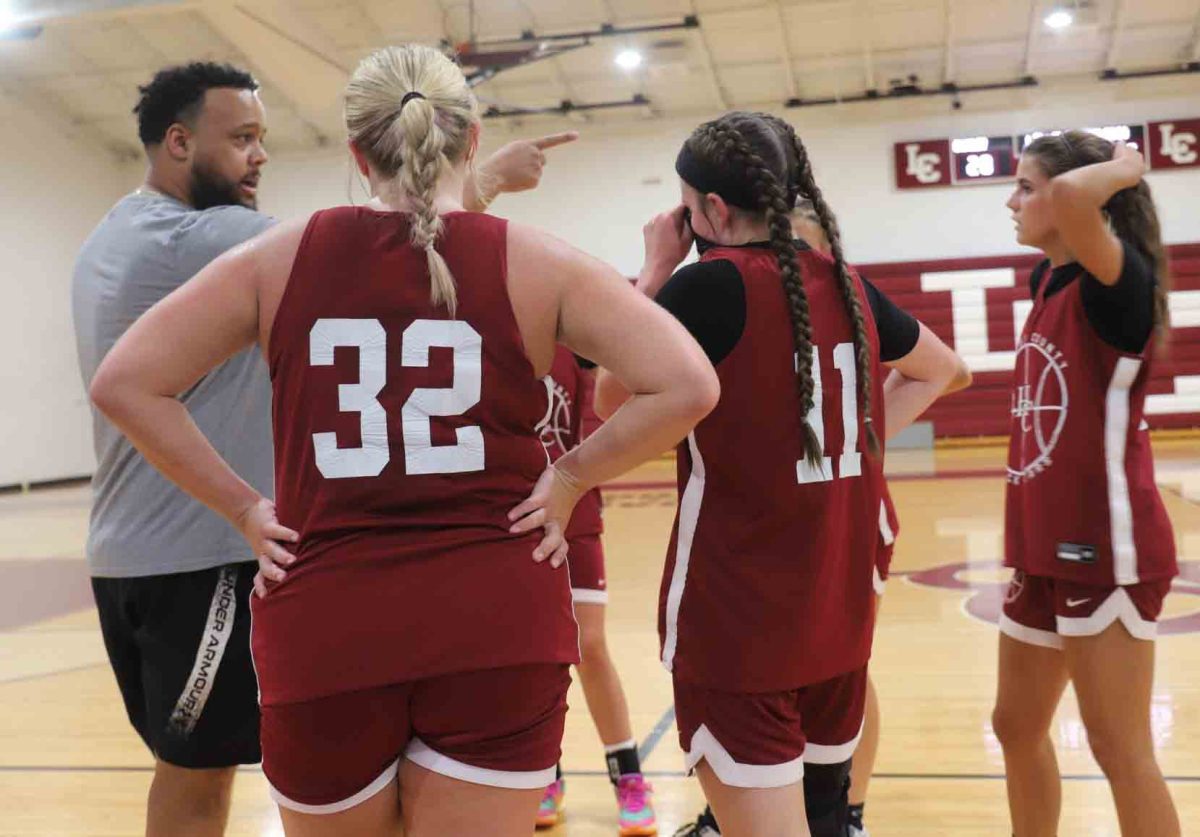 Harlan County coach Gary Greer talked to his Lady Bears during summer scrimmage action earlier this month at Leslie County High School.