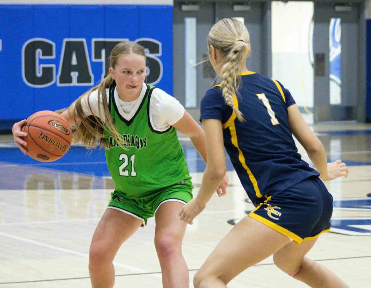 Harlan senior guard Cheyenne Rhymer worked against Knox Central's Kaylie Gambrel-Garrison in summer action Monday at Bell County. The Lady Dragons fell 59-34 to Knox Central and 39-33 to Twin Springs, Va. The Lady Dragons fell 60-44 to Perry Central and 66-38 to Leslie County on Tuesday at Leslie County.