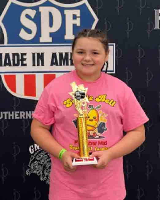 Black Mountain Elementary School fourth-grader Sophie Bell recently broke a national record as the strongest 9-year-old in the world.