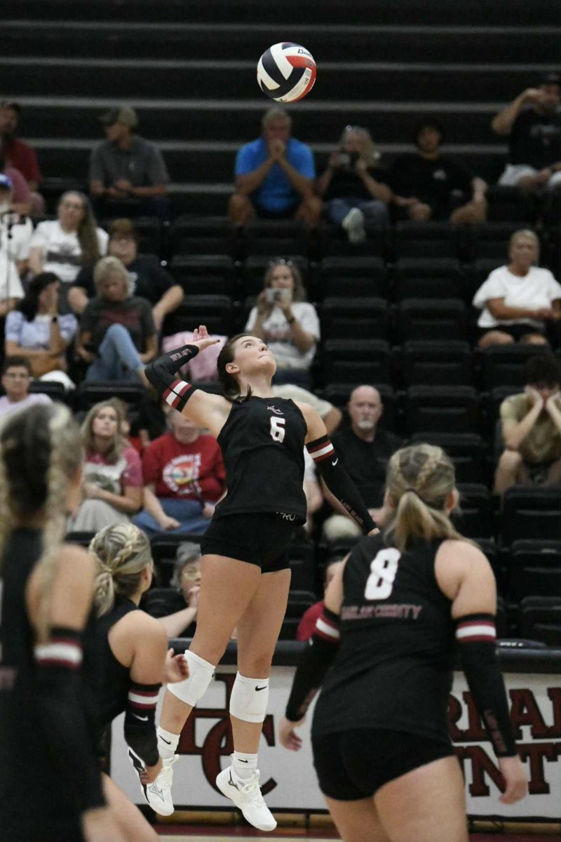 Harlan County senior Kalista Dunn went up for a kill in the Lady Bears' season opening match Monday against Whitley County.