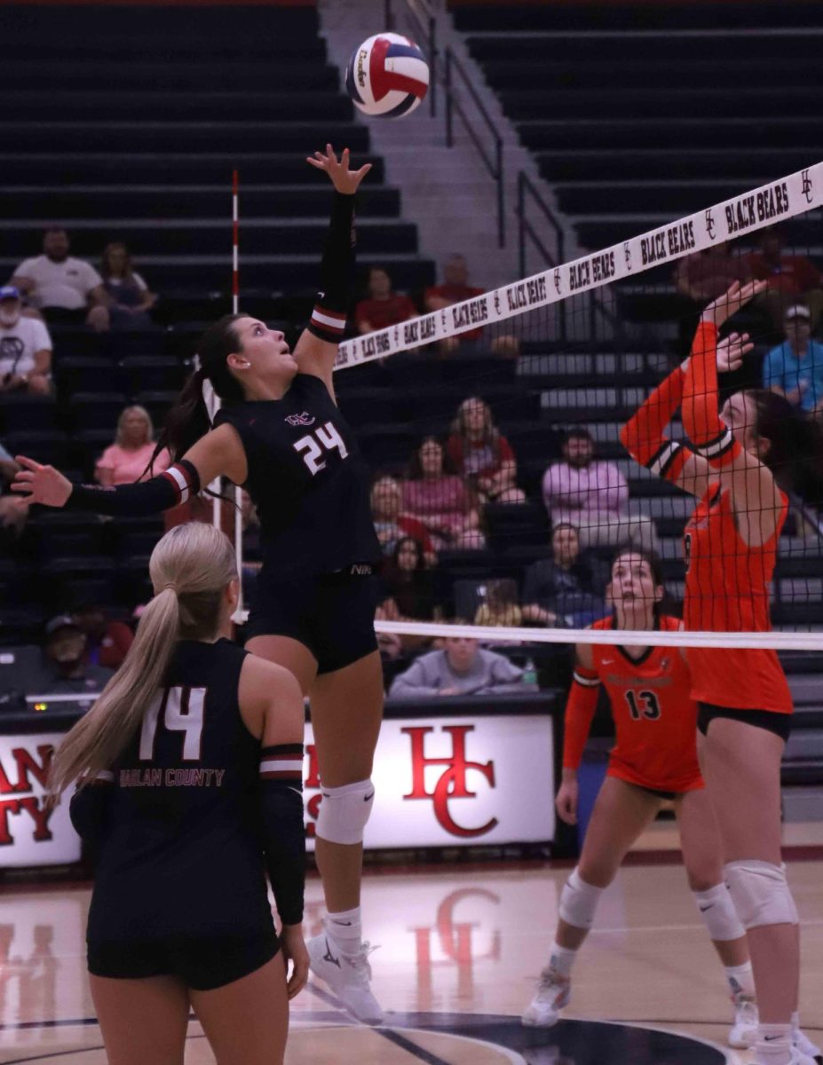 Harlan County's Madilynn Nolan went to the net to finish off a point in the Lady Bears' 25-19, 25-23, 25-18 win Friday over visiting Williamsburg.
