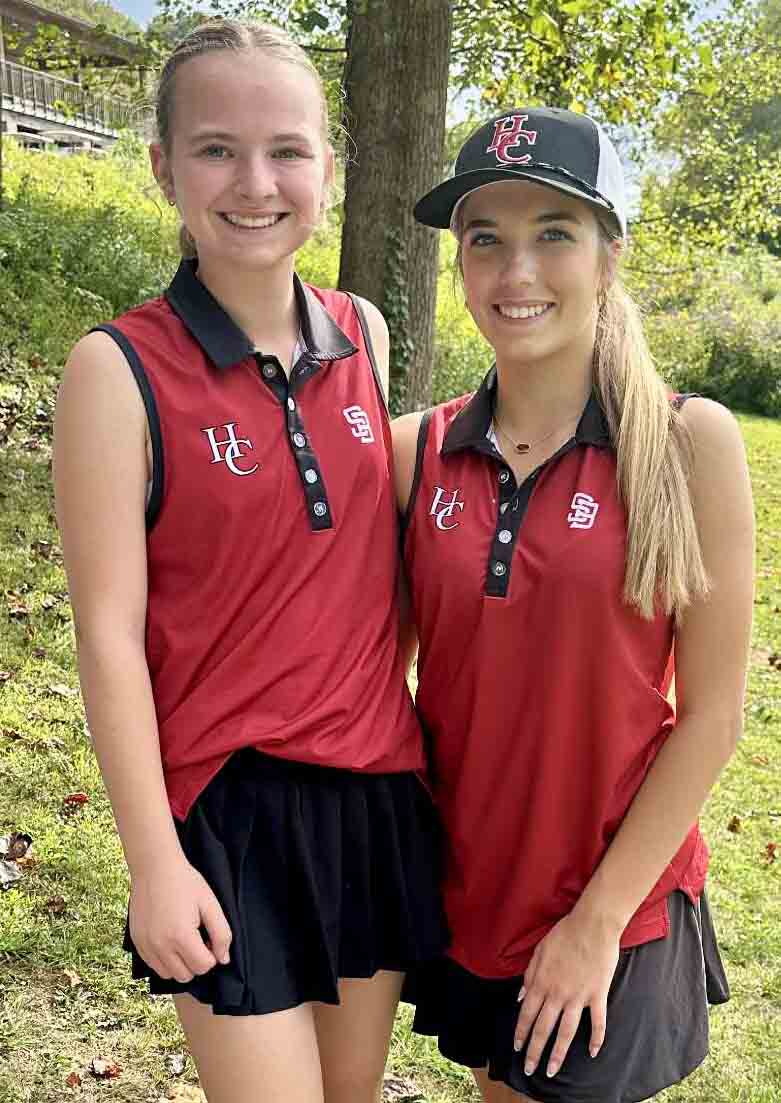 Harlan County's Hailie Hensley (right) was first and teammate Annie Burton was second in a tournament Wednesday at the Wasioto Winds course in Pineville.