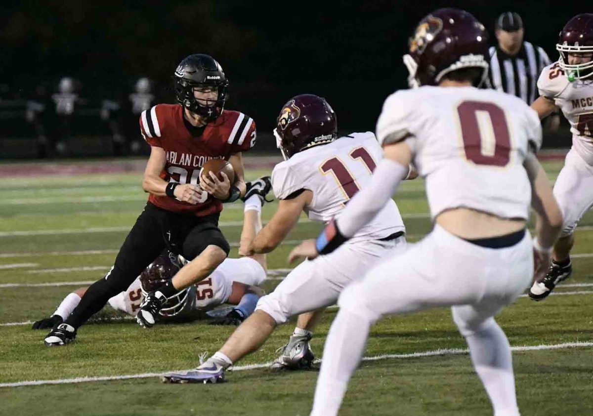 Harlan County sophomore quarterback Brayden Morris cut back against the McCreary Central defense in Friday's game. Morris ran for 185 yards and passed for 130 in the Bears' 36-13 win.
