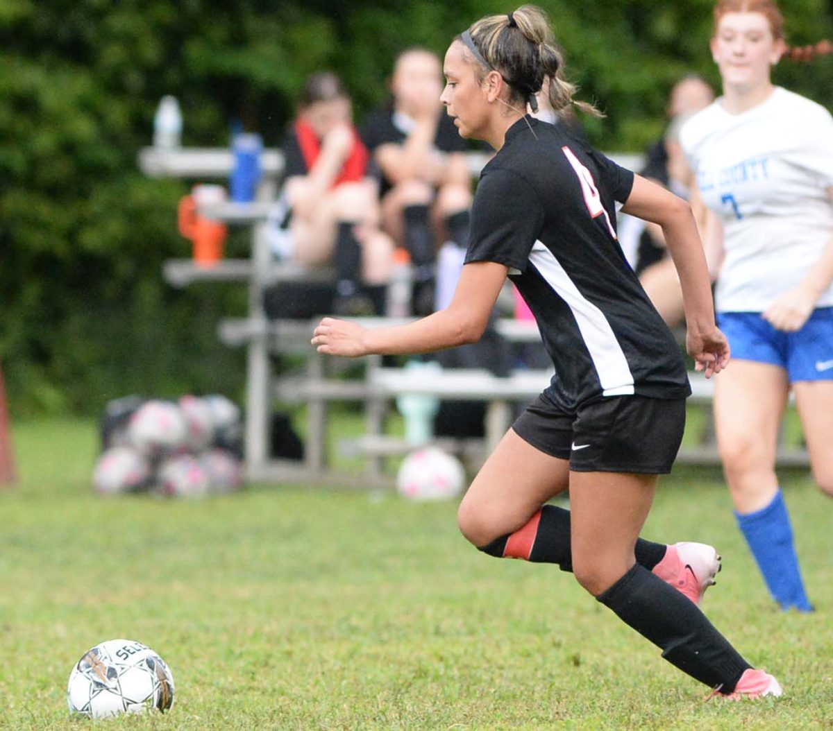 Harlan County sophomore Adriana Rowe, pictured in action last season, scored three goals Tuesday in her first game back with the Lady Bears in a 5-4 win over Knox Central.