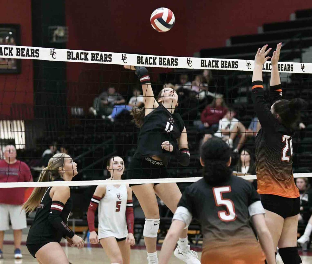 Harlan County’s Kylee Hoiska slammed home one of her 14 kills Tuesday in the Lady Bears’ three-set victory over Lynn Camp.