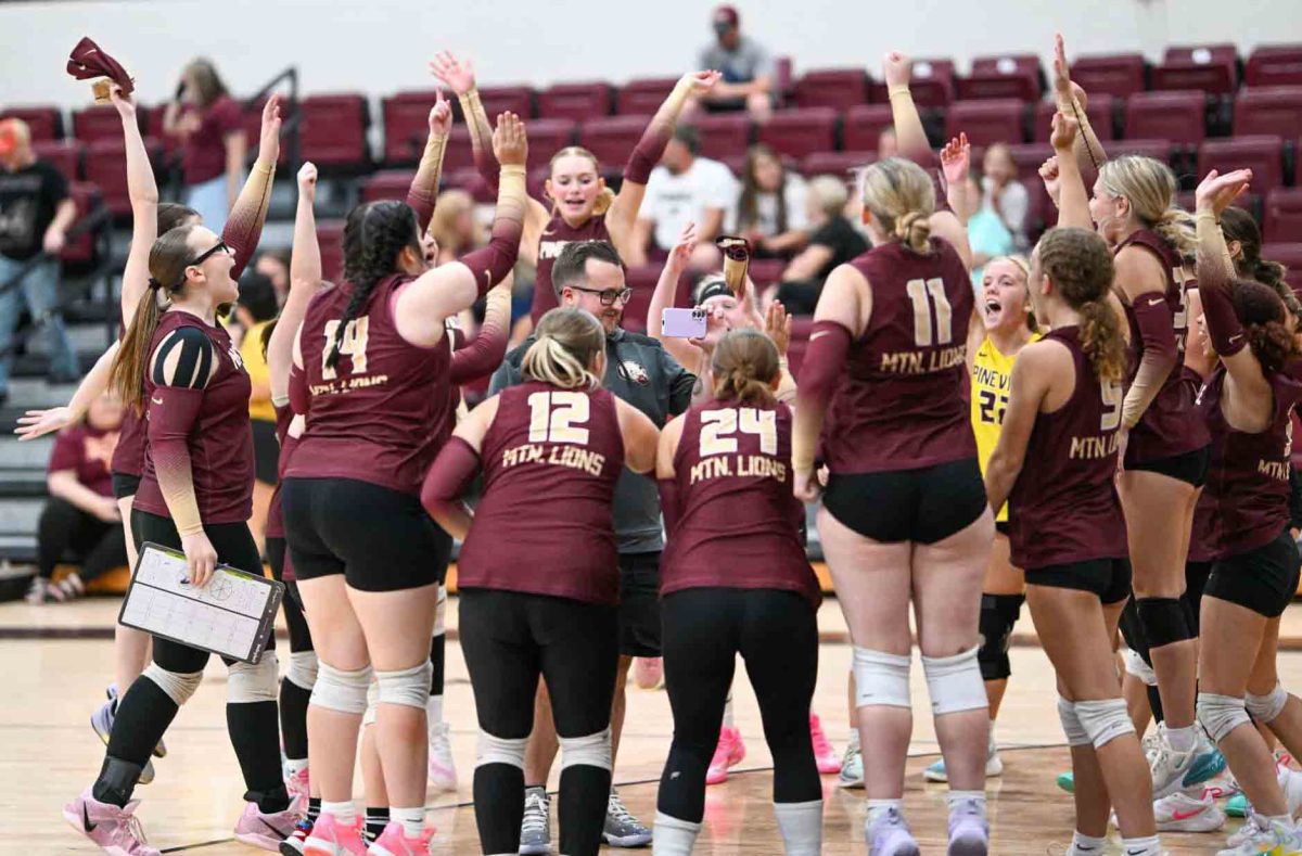 Pineville assistant coach Jon North, pictured after a win earlier this season, led the Lady Lions to a five-set victory on Thursday at Red Bird, his alma mater.