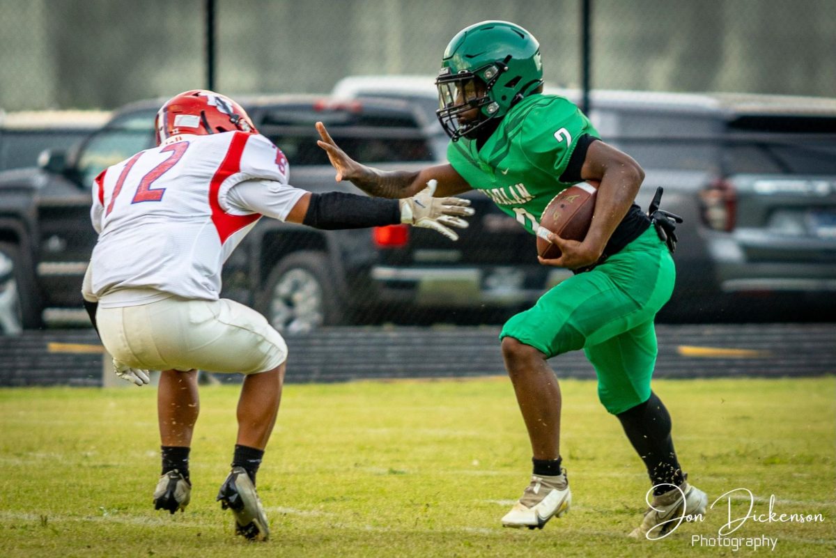 Harlan sophomore running back Boss Bryson scored two touchdowns Friday as the Green Dragons defeated Berea 18-14.