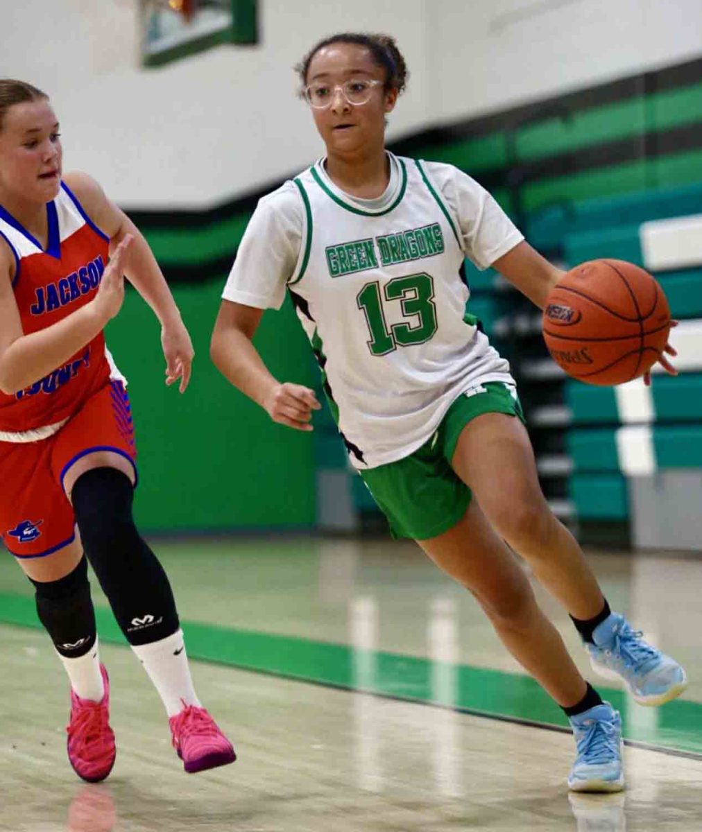 Harlan's Torrie Sundy headed to the basket in action earlier this season. Sundy had nine rebounds in the Lady Dragons' 26-11 win.