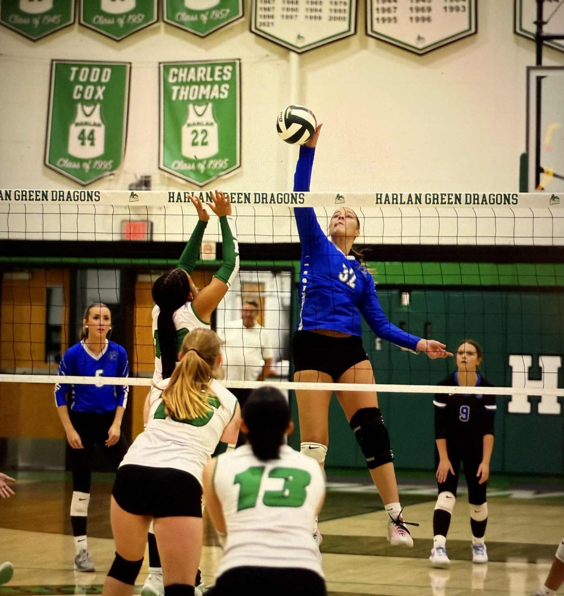 Bell County senior Kairi Lamb went up to finish off a point in a district victory at Harlan last week.
