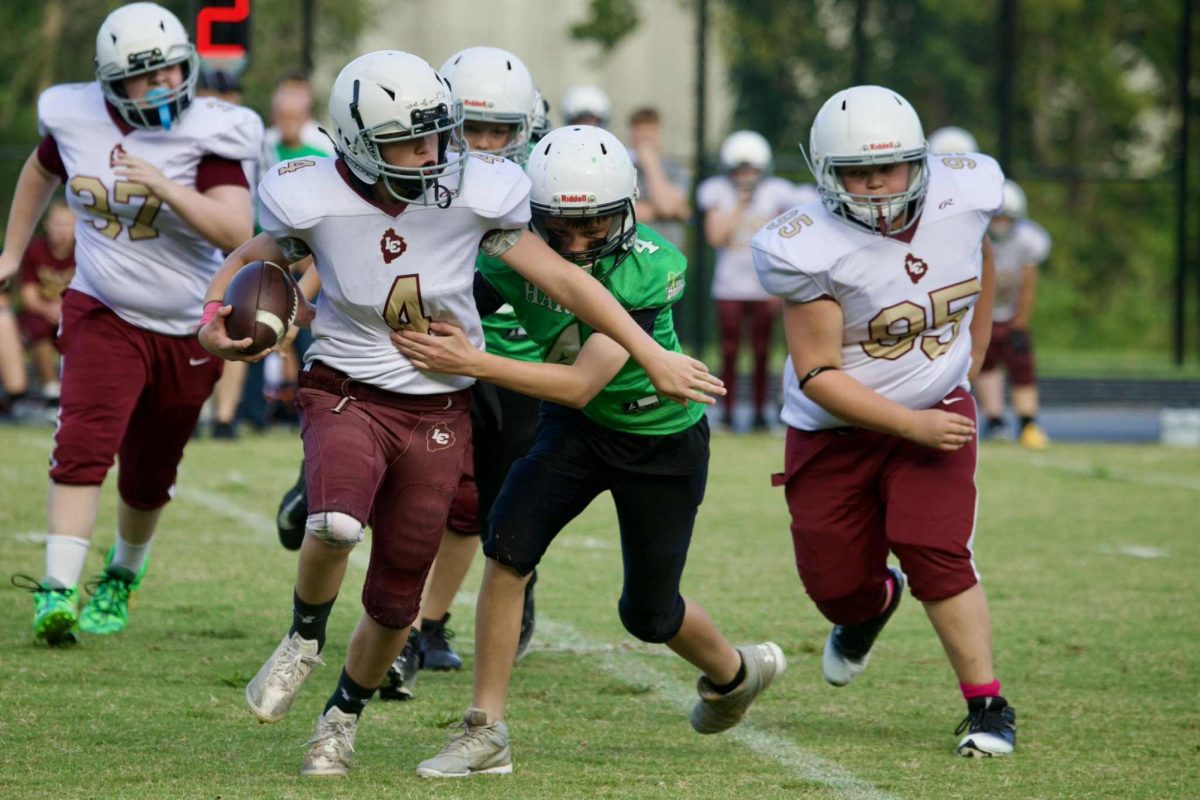 Harlan's Bryson Millis brought down a Leslie County ball carrier in action earlier this season. The Dragons improved to 4-0 with a 34-8 win over Jackson County on Thursday.