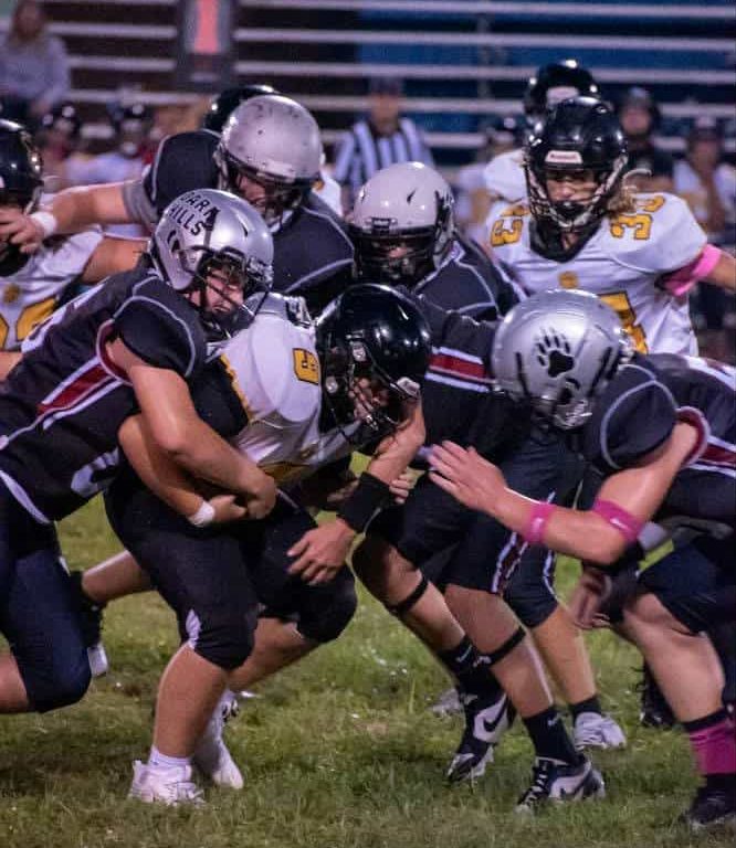 Carson Sanders, Ryder Ecker, Jax Short, Brantley Burkhart and Leland Cope teamed on a tackle in action earlier this season. The Bears held Southwestern to minus five yards rushing in a 28-0 win Saturday at Evarts.