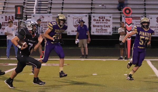 Harlan County tailback Hudson Faulkner broke free for a big gain in the Bears' 30-0 win Tuesday over Fleming-Neon. Faulkner ran for 103 yards on three carries.