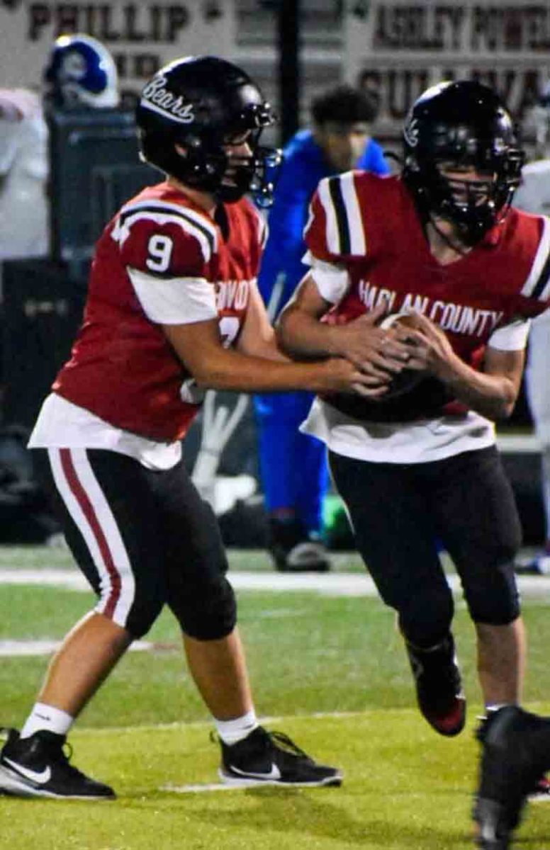 Jackson Mackowiak handed the ball off to Eli Joseph in action earlier this season. Both are members of the HCHS junior varsity squad that defeated Middlesboro 20-8 on Monday.
