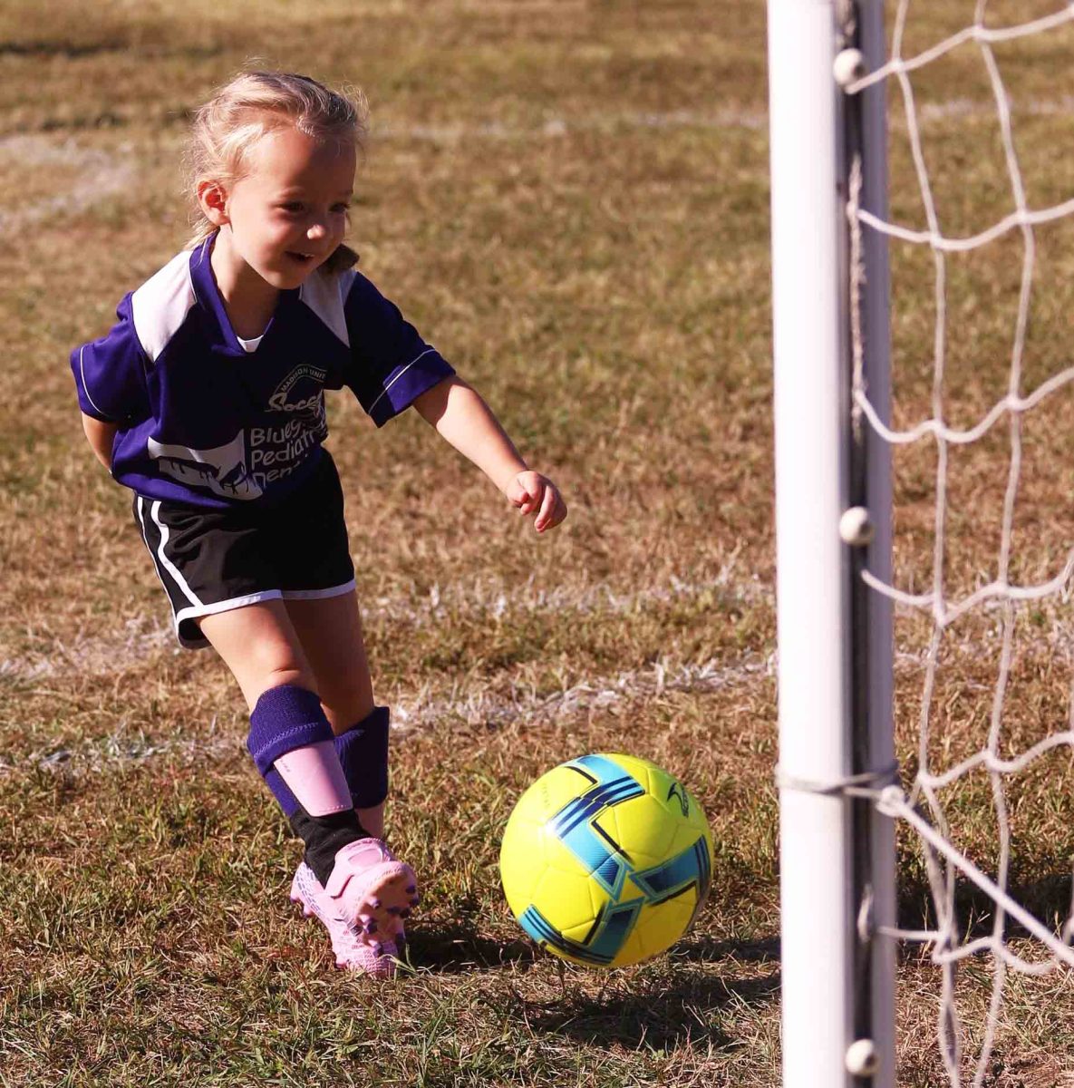Riley Fruth, 3, finished off a goal in action from the Richmond Youth Soccer League on Saturday.