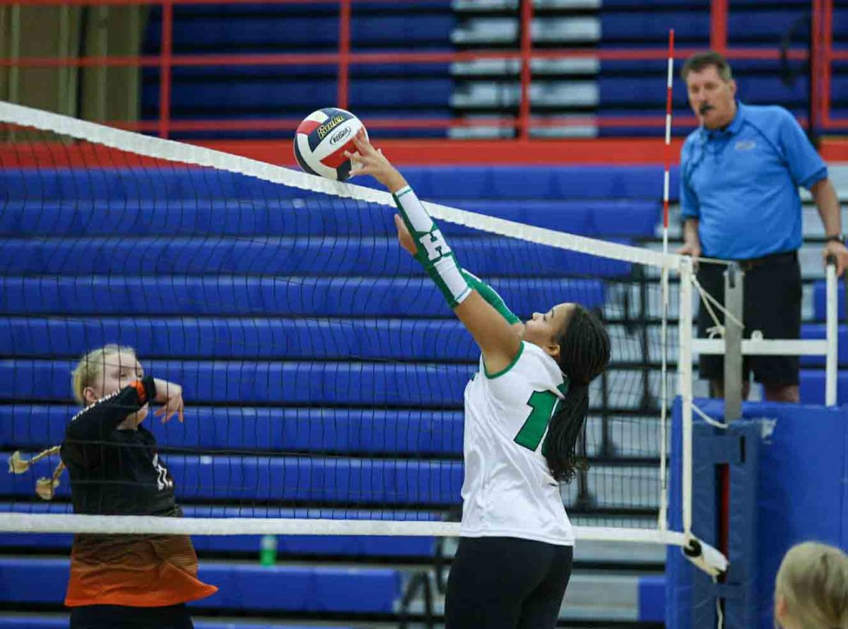 Harlan sophomore Peyshaunce Wynn went to the net to finish off a point against Lynn Camp in the 13th Region All "A" Classic on Saturday. The Lady Dragons won two matches before falling to Barbourville in the semifinals.