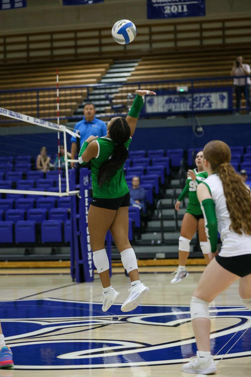 Harlan sophomore Peyshaunce Wynn went up to finish off a point Tuesday at Bell County.