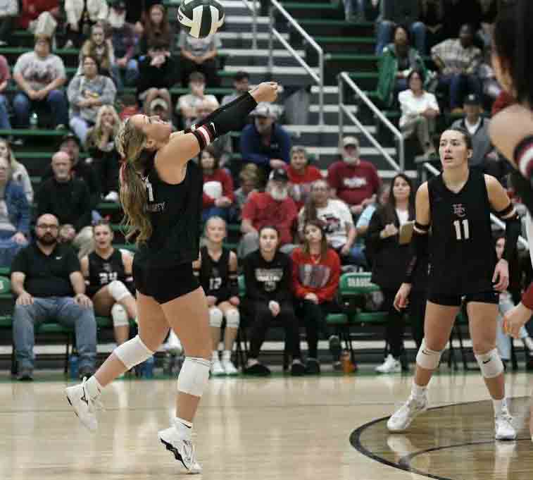 Harlan County senior Savannah Hill, the tournament most valuable player, set the ball for a teammate during the Lady Bears' five-set win over Bell County in the 52nd District Tournament finals Tuesday.