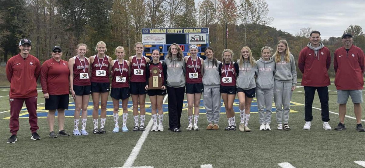 The Harlan County Lady Bears won their third straight Region 7 title on Saturday at Morgan County. Team members, from left, include assistatn coach Jacob Carroll, assistant coach Erica Moore, Kiera Roberts, Lauren Lewis, Andrea Napier, Preslee Hensley, Suzy Mumford, Riley Witt, Gracie Roberts, Sienna Banks, Julionna Johnson, Autumn Farley, Bella Leath, Ariel Farley, assistant coach David Lee and coach Ryan Vitatoe.