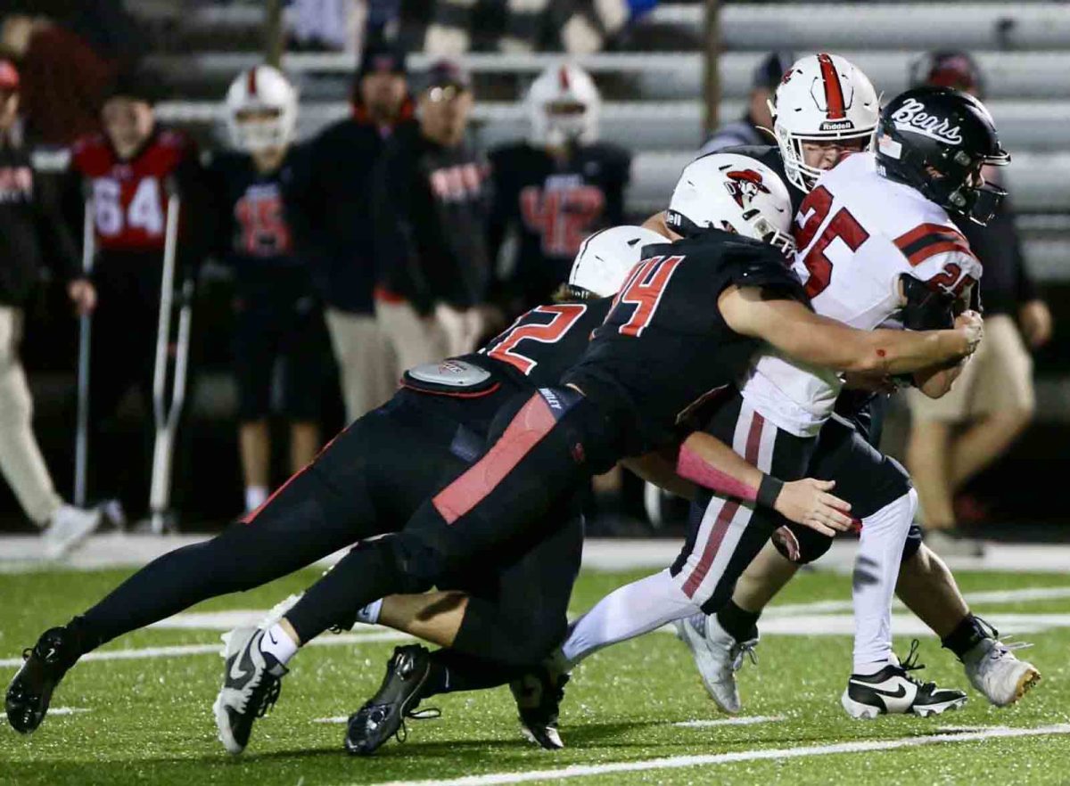 Harlan County sophomore Brayden Morris rumbled through the Whitley County defense for 287 yards and three touchdowns in a 26-7 win Friday at Whitley County to clinch second place in their district and a home playoff game for the first time since 2019.