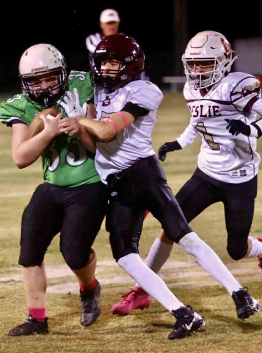Harlan running back Rylan Rodriguez battled for yardage in a state playoff game Tuesday against Leslie County. The visiting Eagles advanced with a 30-6 victory.