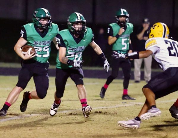 Harlan junior running back Landon Kirby, pictured in action earlier this season, scored the Green Dragons' lone touchdown Friday in a 34-6 loss at Lynn Camp.
