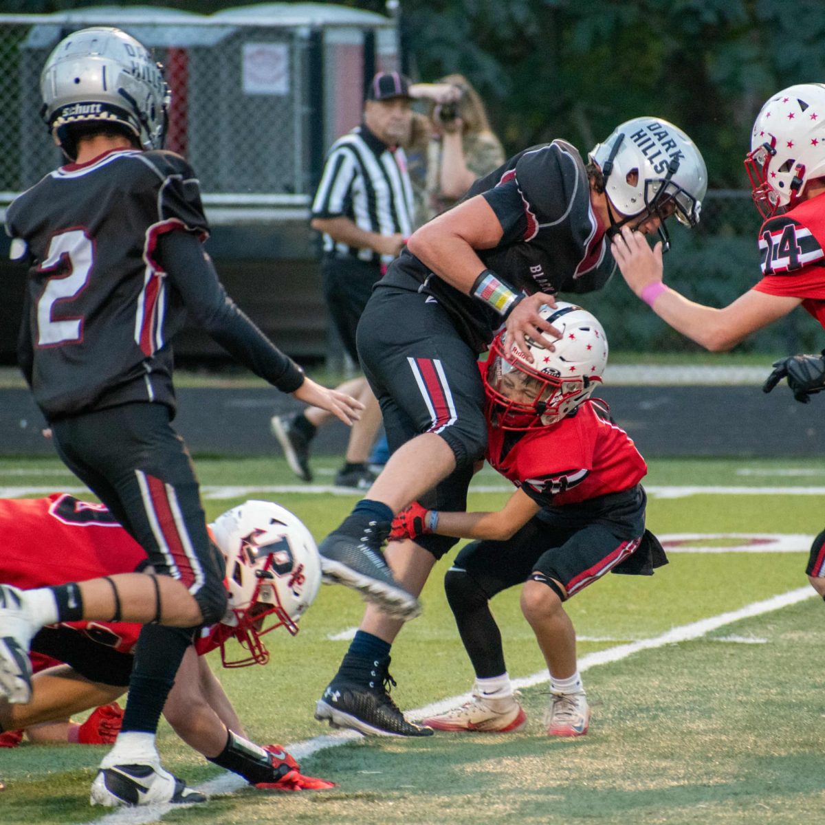 Harlan County's Hudson Faulkner ran through the Perry Central defense in state playoff action Saturday. Faulkner scored three touchdowns in the Bears'30-6 win.