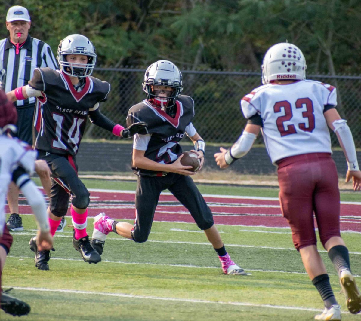 Harlan County quarterback Rayce Bryant followed receiver Jase Wynn on one of his long runs during the Bears' 38-6 win Saturday over Pikeville in the state playoffs. Bryant teamed with Wynn on two touchdown passes.