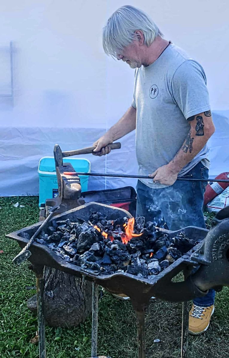 Michael Ensor, of Valraven Forge, demonstrated his blacksmithing skills to visitors of this year's 61st annual Kingdom Come Swappin' Meetin'. 
