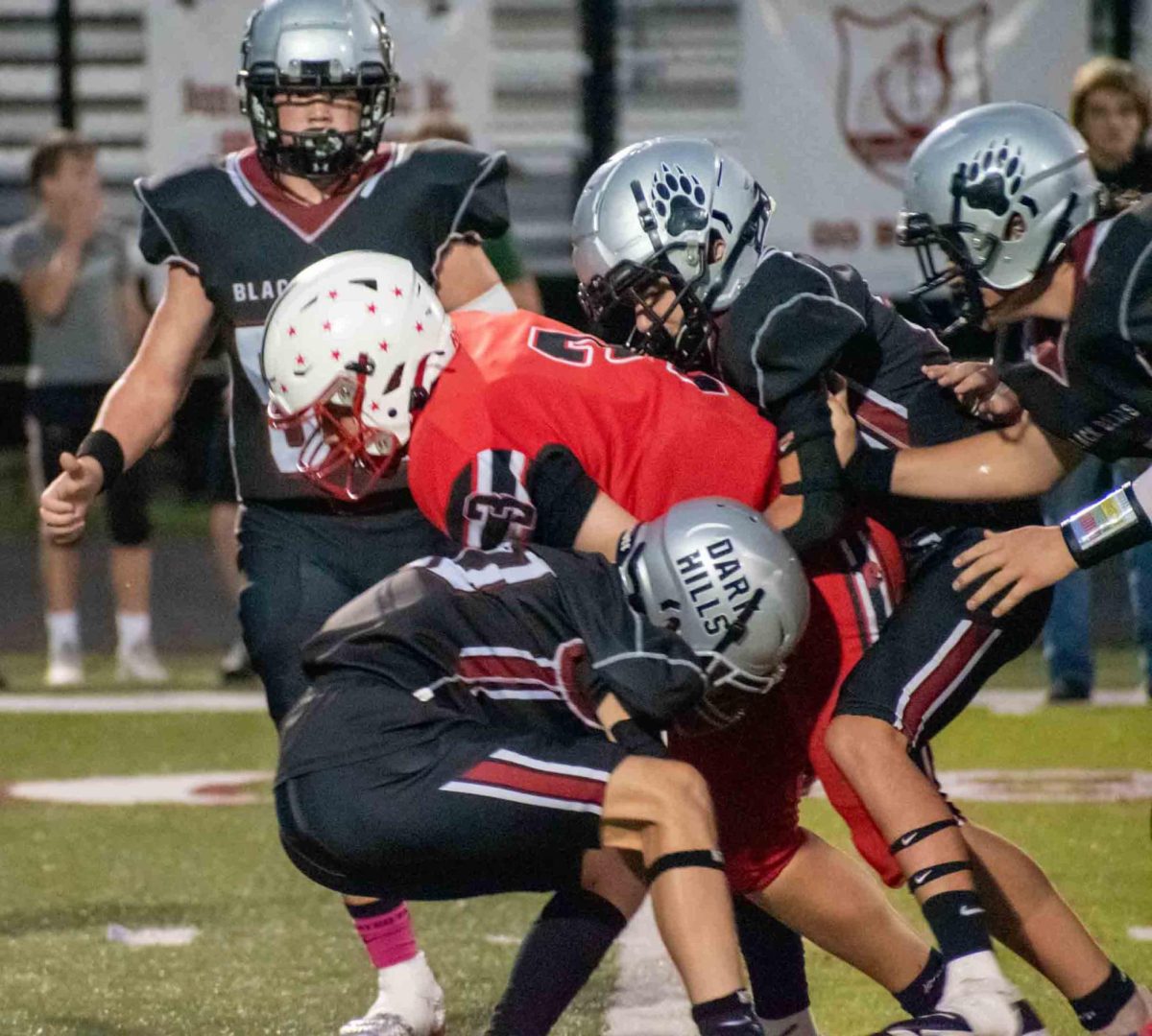 Logan Mills and Brantley Burkhart brought down a Perry Central ball carries in Saturday's game. The Bears improved to 10-0 with a 42-6 victory.