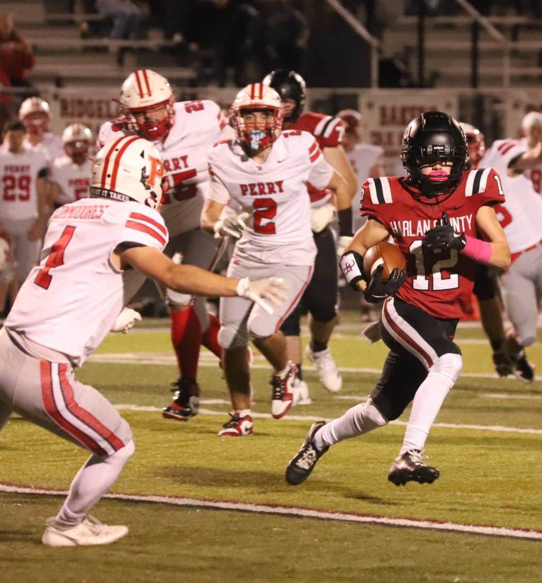 Harlan County junior tailback Jonah Sharp broke free for a big gain in the Bears' 23-22 comeback win Friday over visiting Perry Central. Sharp's 34-yard touchdown run in the fourth quarter pulled the Bears even before Austin Tye hit the winning extra point.