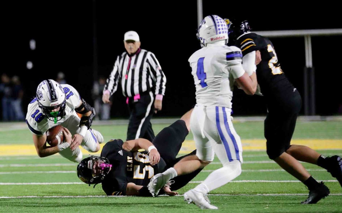 Bell County receiver Brayden Carroll sailed for extra yardage during the Bobcats' 39-16 win Friday over Clay County.