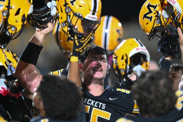 The Middlesboro Yellow Jackets celebrated after holding off Hazard 44-36 on Friday in the second round of the Class A playoffs.