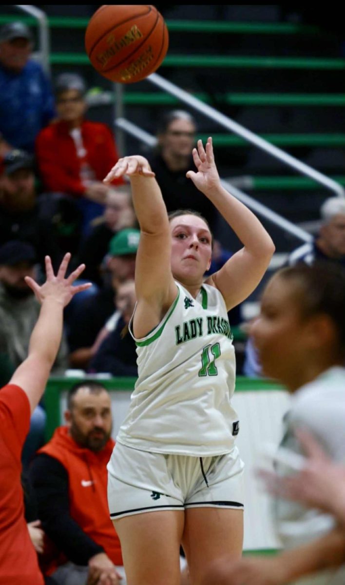 Harlan sophomore Addison Campbell put up a shot in scrimmage action Thursday against Lee, Va. Campbell scored 13 points to lead the Lady Dragons in a 40-20 victory.
