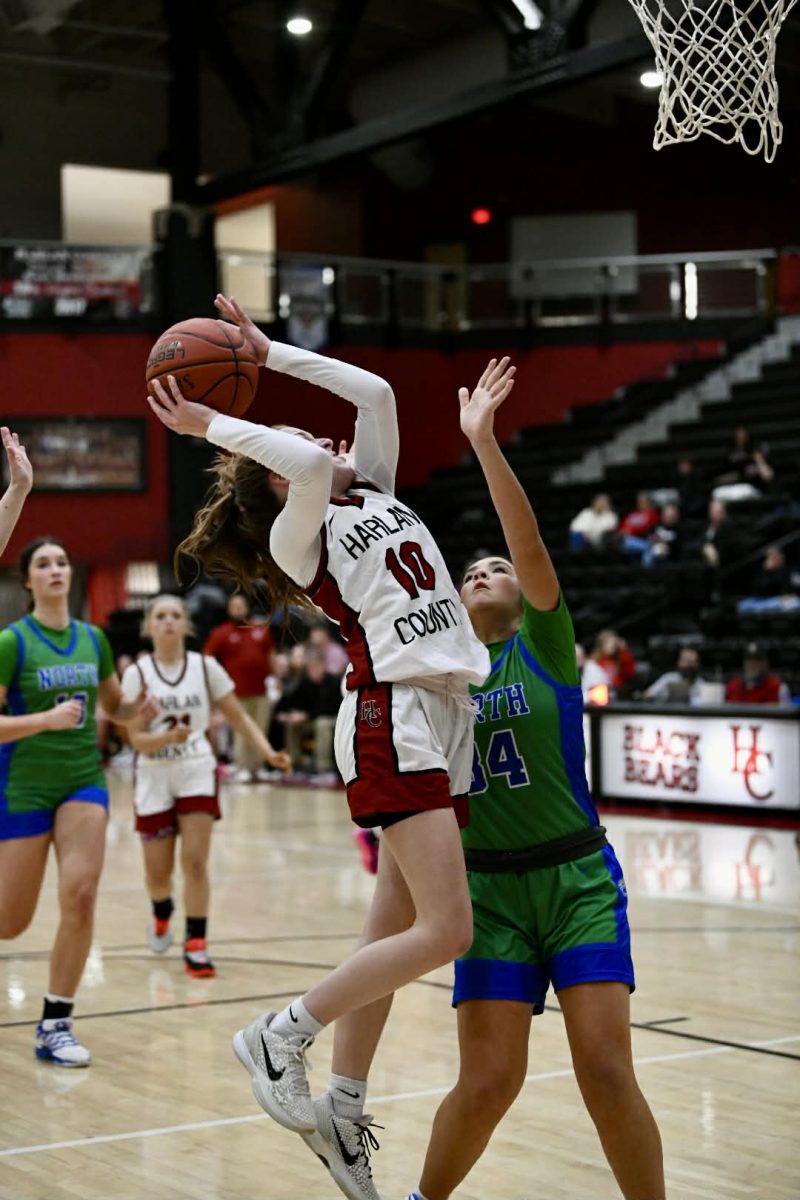 Harlan County guard Jaycee Simpson twisted around a North Laurel for two of her team-high 13 points in the Lady Bears’ loss to North Laurel on Tuesday.