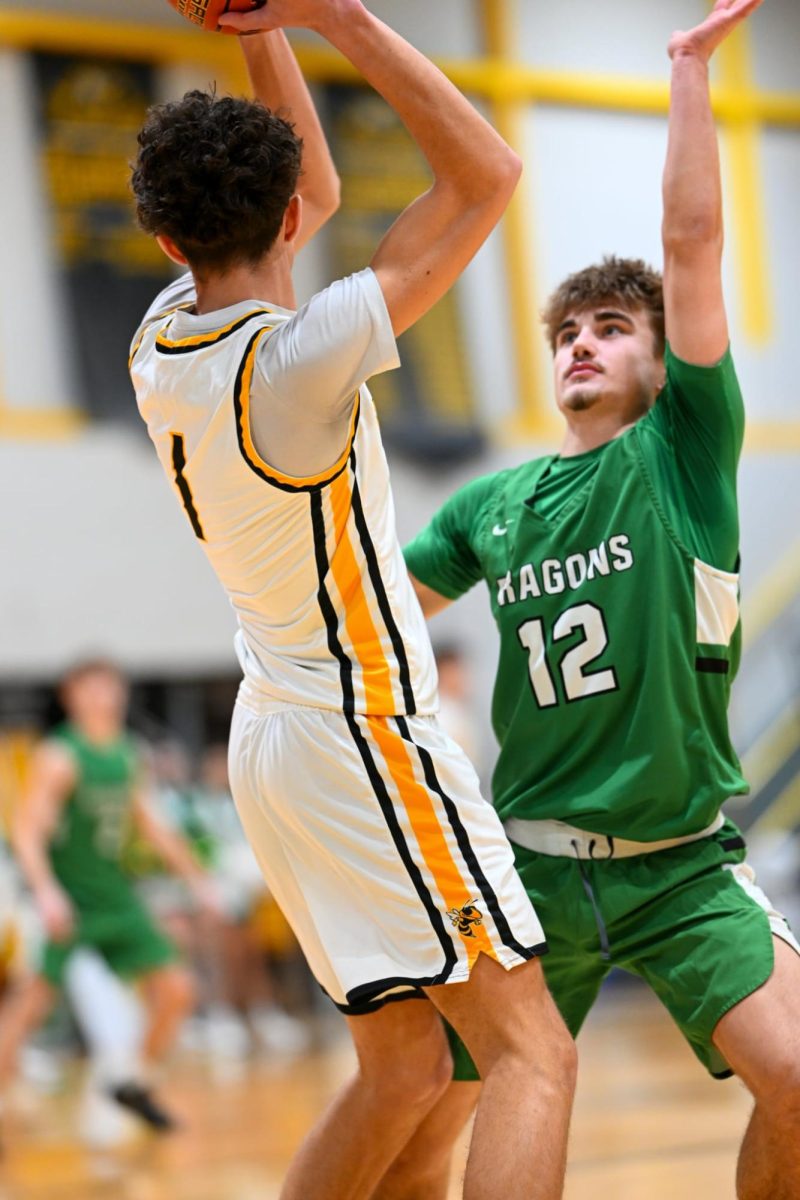 Harlan guard Ethan Huff worked on defense in Friday's game at Middlesboro. The Green Dragons dropped a 73-68 decision on Saturday against Rockcastle County.