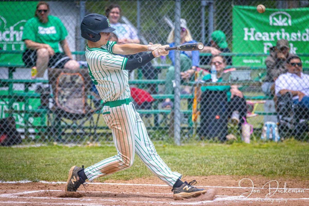 Harlan senior catcher/pitcher Brody Owens, pictured in action last season, has committed to continue his baseball career at Transylvania University.