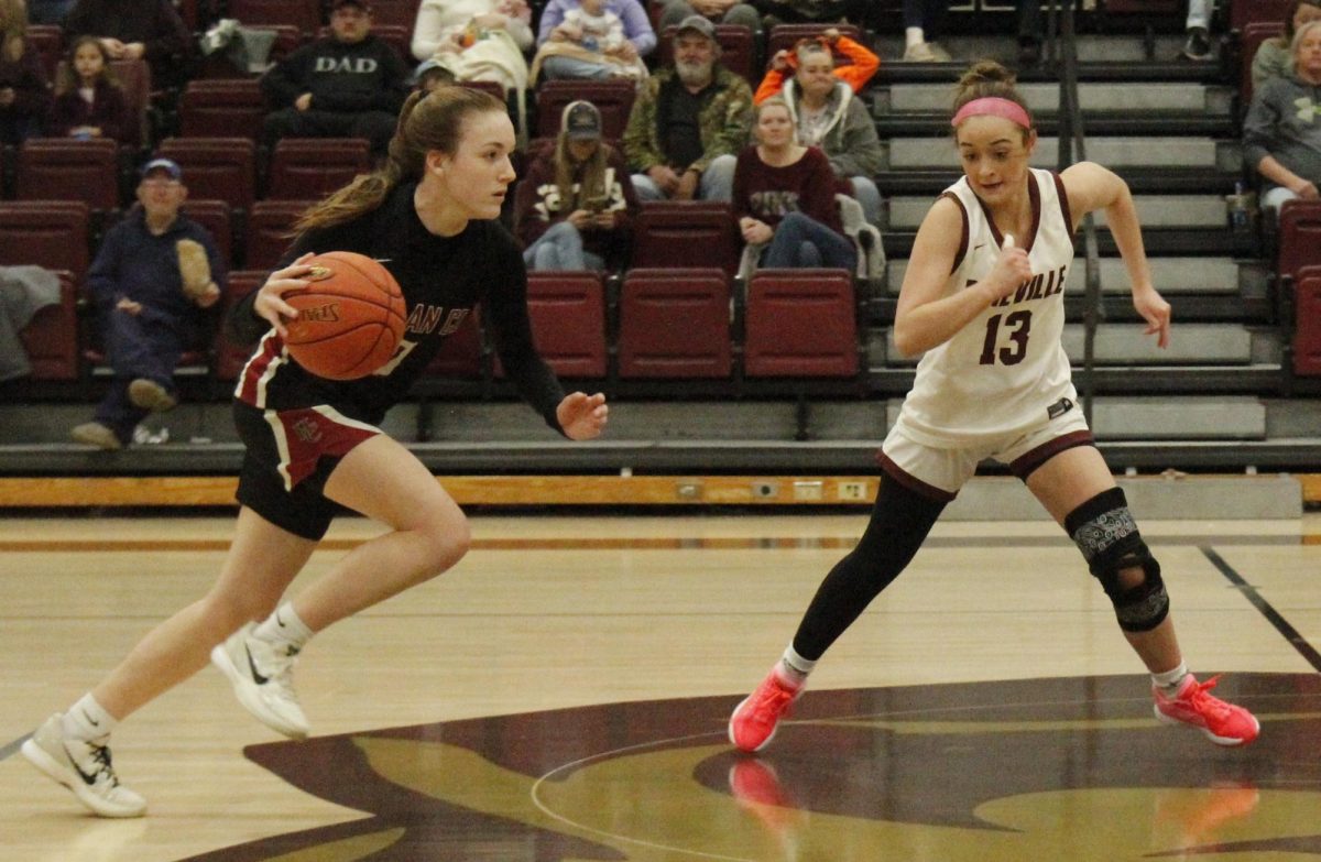 Harlan County guard Jaycee Simpson worked down the court against Pineville's Hannah Abner in Friday's game. Simpson scored 27 points in the Lady Bears' 62-48 victory.