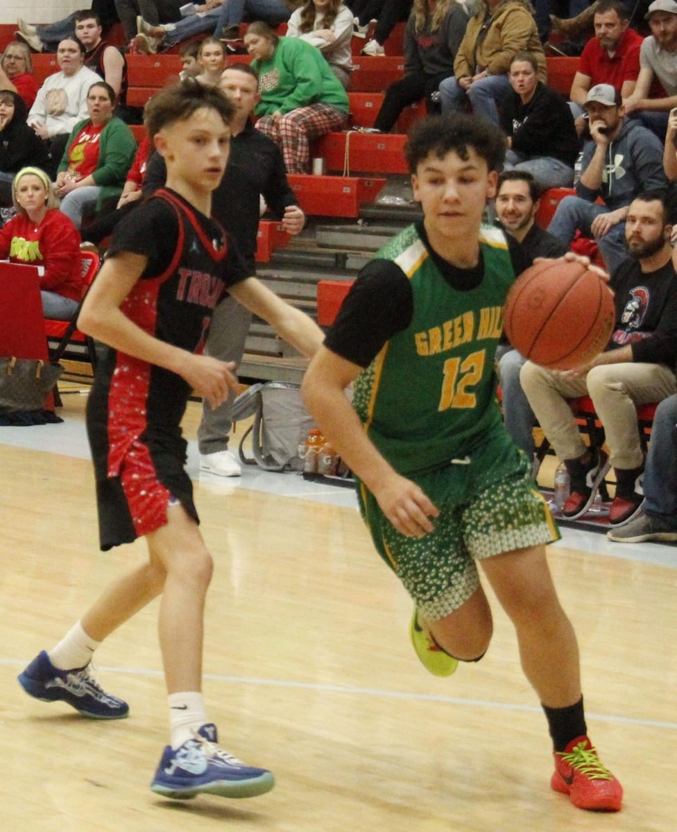 Green Hills guard Pheonix Morgan drove to the basket in middle school basketball action Thursday at James A. Cawood Elementary School.