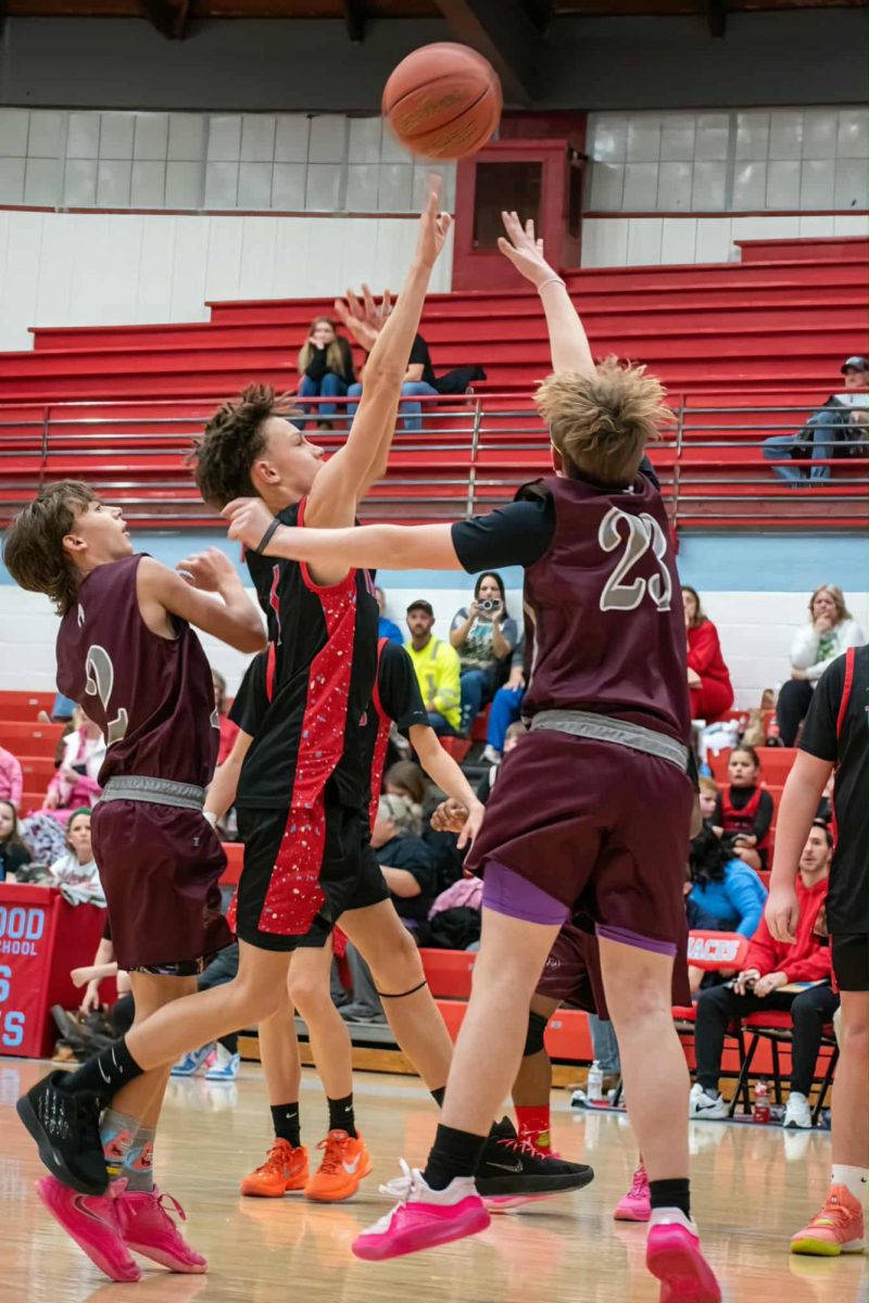 James A. Cawood's Tucker Daniels worked in for a shot in action last week against Cumberland. The two teams met again Monday in Cumberland with the Trojans winning the seventh- and eighth-grade game and the Redskins winning in fifth- and sixth-grade action.